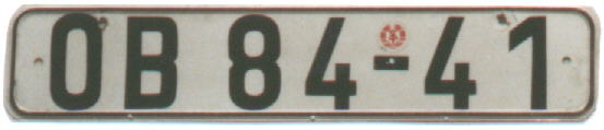 OB 84-41. Ein DDR-Kennzeichen aus dem Bezirk Suhl. Das rote Klebesiegel deutet auf eine Ausstellung ab 1987 hin. (c) Ralfs Schilder-Seite. Vielen Dank!